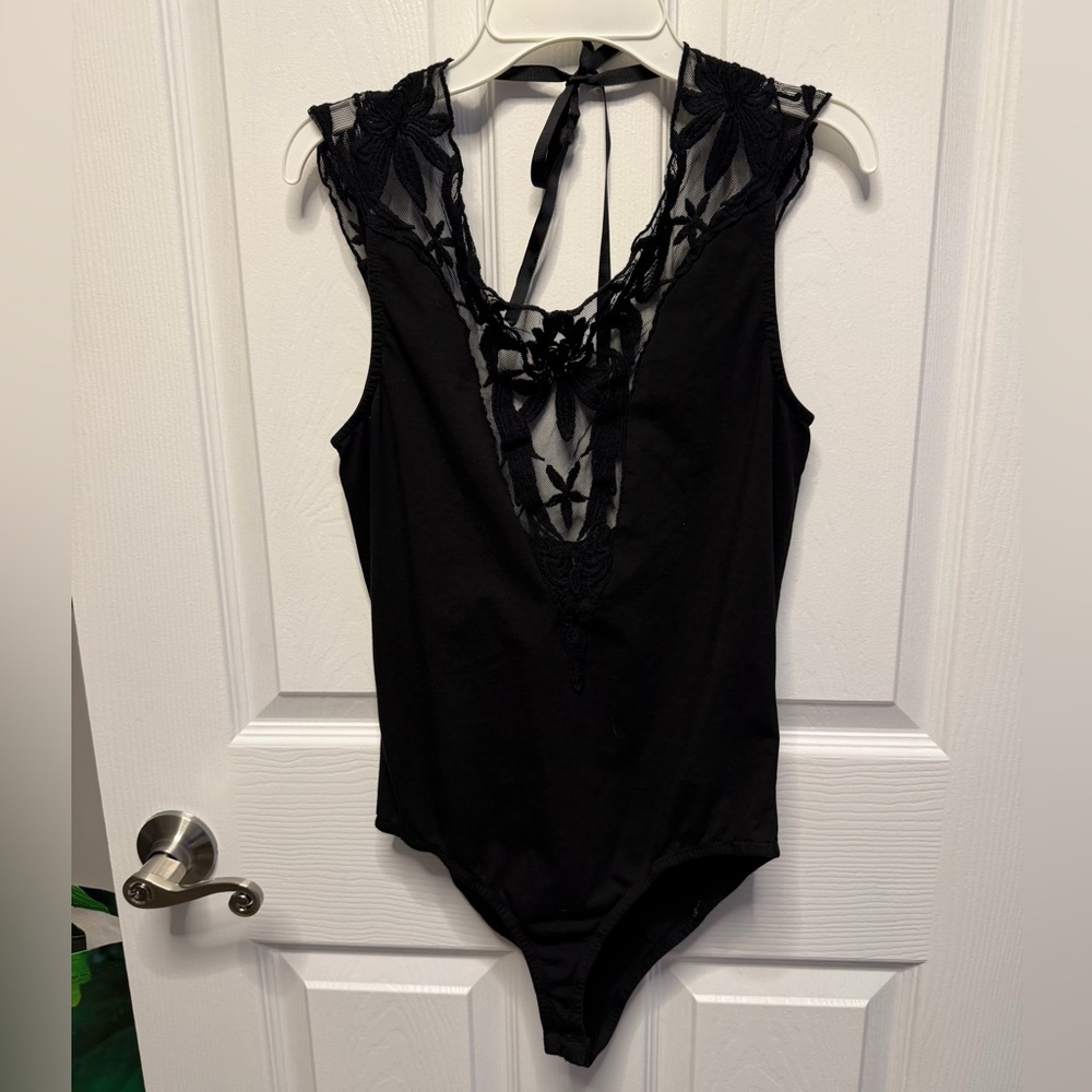 Black bodysuit with lace cutout